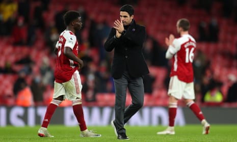 Mikel Arteta applauds Arsenal’s fans after the home defeat by Burnley.
