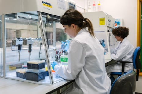 Researchers work in a laboratory, using genome sequencing equipment manufactured by Oxford Nanopore Technologies, at Guy's and St Thomas's Hospital in London.