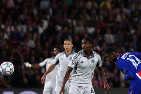 Ousmane Dembele (right) heads the ball to score his, and Paris Saint-Germain’s, second goal.