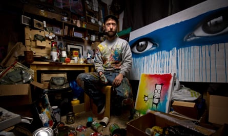 The artist My Dog Sighs in his studio