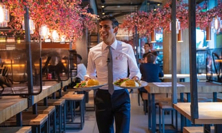 Rishi Sunak promoting ‘eat out to help out’ in a Wagamama restaurant.
