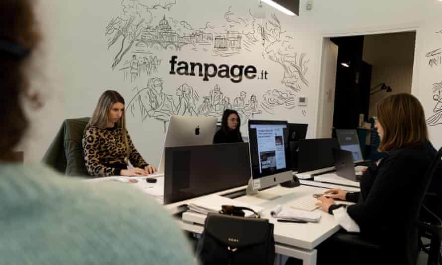 Employees at work in the Fanpage.it office