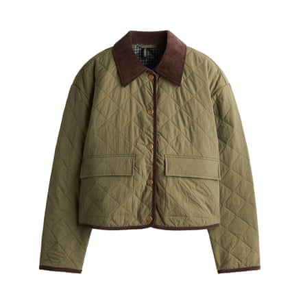 A short quilted khaki jacket with a dark contrast collar on a white background