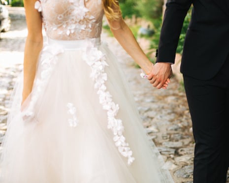 Cropped picture of couple on wedding day.