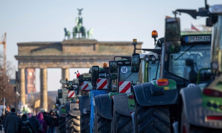 Tractors parked in front of the Brandenburg Gate in Berlin during the farmers’ protest