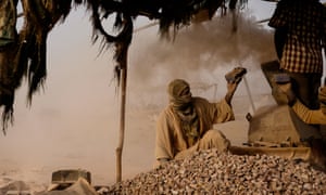 A worker at an informal mining area on northern Sudan.
