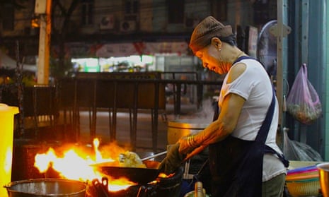 Flame on … owner and chef Jay Fai at her shop-house restaurant, Bangkok, Thailand