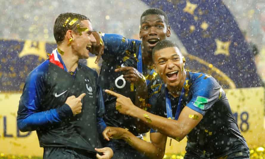 Antoine Griezmann, Paul Pogba and Kylian Mbappé celebrate France’s win at the 2018 World Cup.