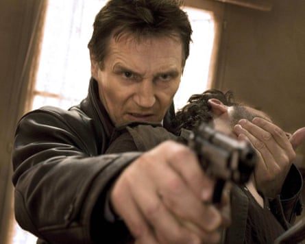 Liam Neeson in Taken, holding a man by the throat while pointing a gun