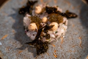 Seaweed adorns a fish dish