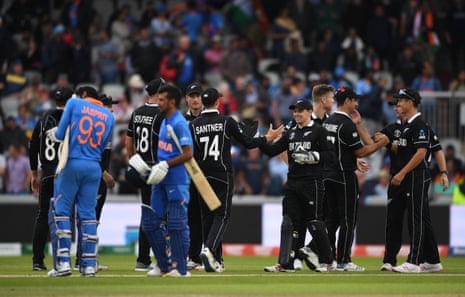 The two sides shake hands as New Zealand win the semi-final.