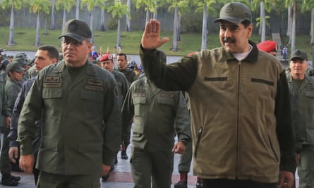 Vladimir Padrino López (left) and Nicolás Maduro
