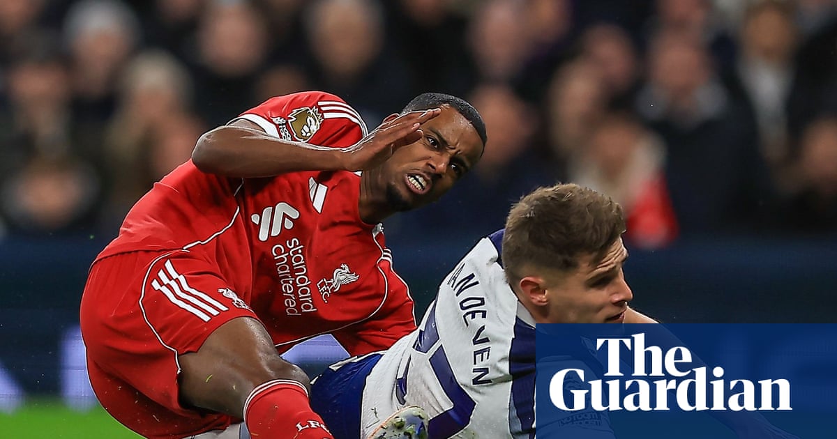 Liverpool cling on to win chaotic clash against nine-man Spurs but Isak injured