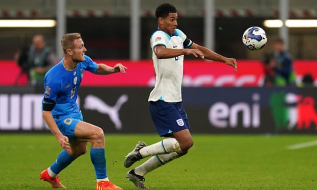 Jude Bellingham (right) on the ball, watched by Italy’s Tommaso Pobega