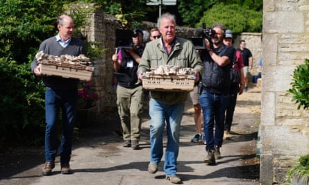 Jeremy Clarkson carrying a basket of mushrooms