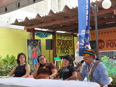 People speak on a panel at Embaixada dos Povos, or People’s Embassy, in Belém, where activists are pushing for more consideration of environmental justice at the Cop30 summit taking place in the city.
