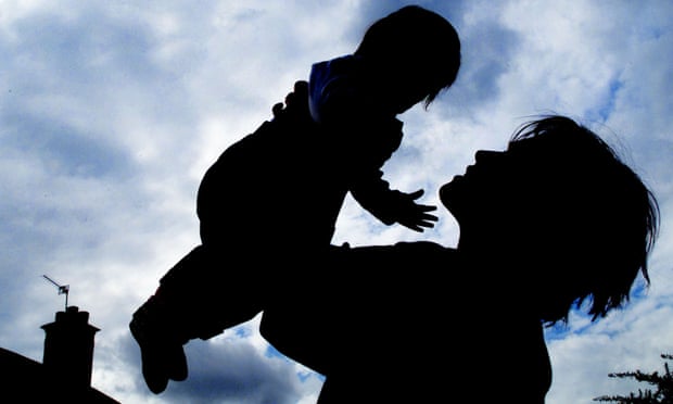 Silhouette of a mother and baby.