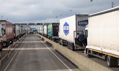 Lorries wait to board a freight train in Calais in 2018