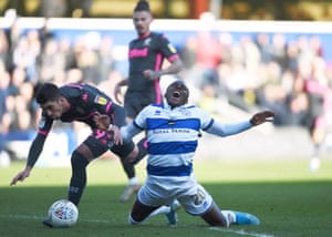 Pablo Hernandez of Leeds United fouls Bright Osayi-Samuel of Queens Park Rangers with a free kick that leads to the first goal.