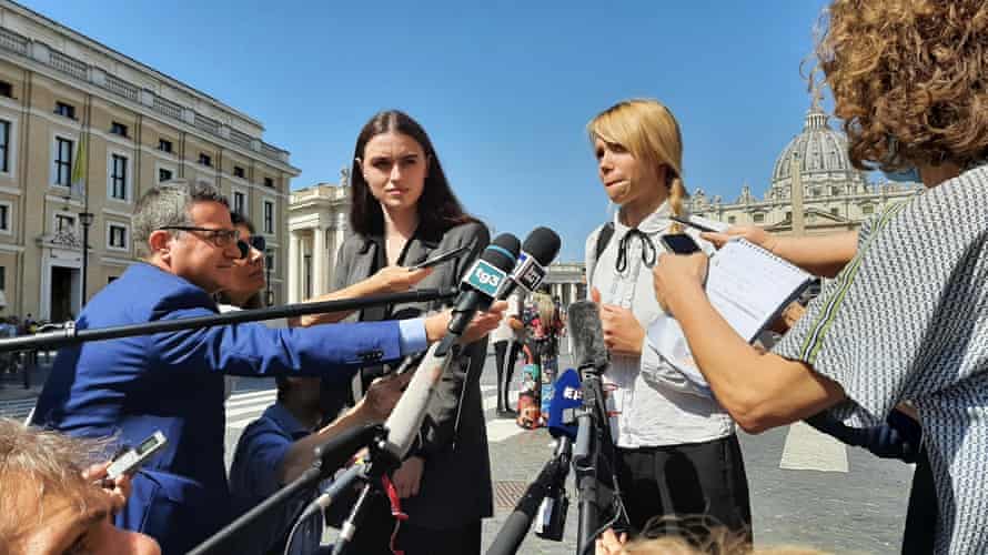 Yulya Fedosiuk (L) and Kateryna Prokopenko (R) speak to the media after meeting the Pope.