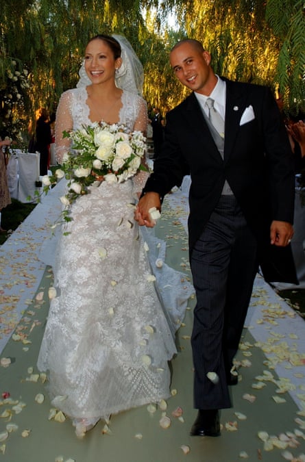 Jennifer Lopez at her 2001 wedding to Cris Judd wearing a dress designed and created by Valentino.