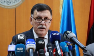 Fayez Sarraj speaks at a press conference