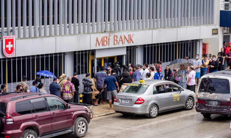 People queued extracurricular  banks and shops connected  Monday successful  the superior  of Nuku’alofa arsenic  they anticipated the government’s announcement of a lockdown.