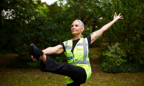 Anne-Marie Newland in a yoga pose, wearing a yellow vest
