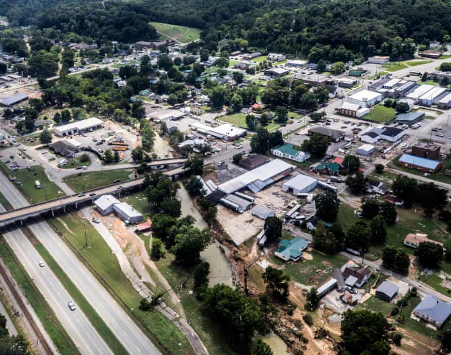 Flood-damaged areas are seen from a helicopter flown by the Tennessee national guard in Waverly.