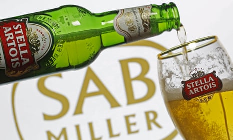 Stella Artois being poured in front of SAB Miller sign