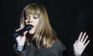 Rihanna shows off her tawny coloured fringe.