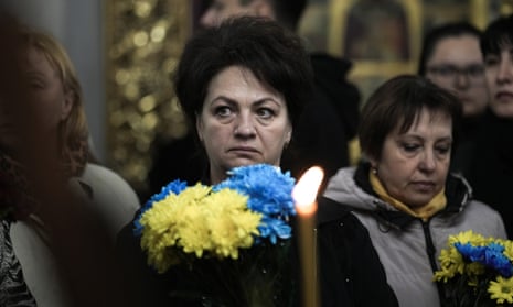 Mourners attend the funeral of Denys Antipov, a soldier and popular economics lecturer at the Kyiv School of Economics.