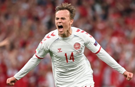 Mikkel Damsgaard celebrates after scoring Denmark’s first goal against Russia at Parken. 