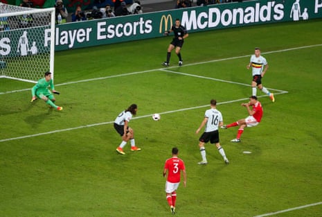 Hal Robson-Kanu wrong-foots three Belgium players and side-foots the ball home.