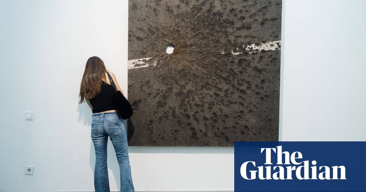 ‘This is our reality’: the Ukrainian artist putting bomb-blasted roads in a gallery