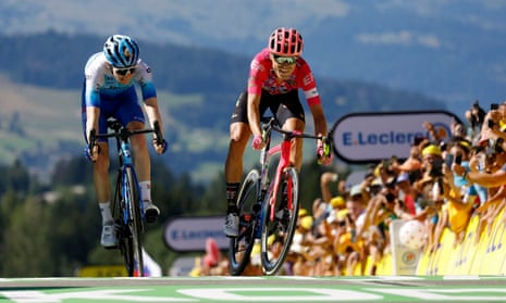 Easypost's Magnus Cort crosses the finish line to win stage 10 ahead of Team Bikeexchange-Jayco's Nicholas Schultz
