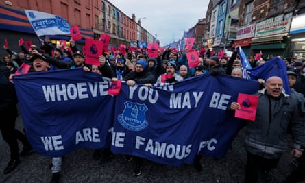 Thousands of Everton fans on a demonstration march to the ground to protest at their 10 point penalty before the game against Manchester United