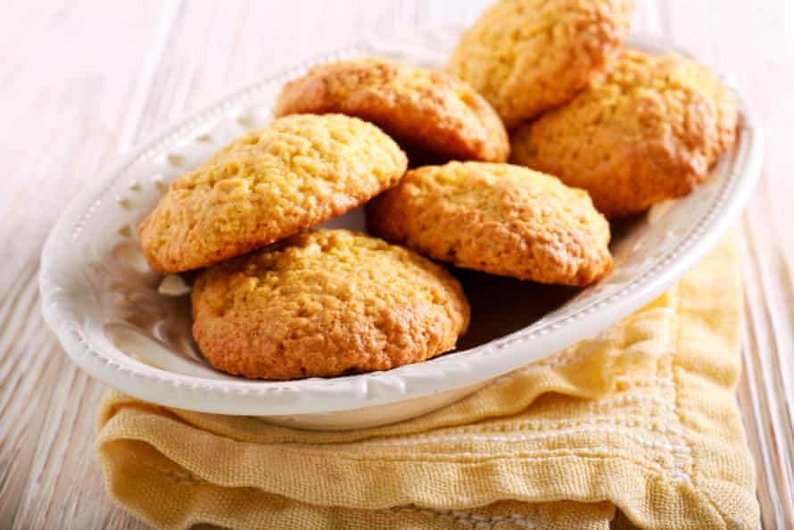 Cornmeal biscuits in a plate on wooden table