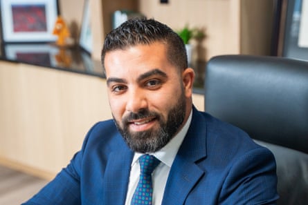 person wearing blue jacket and blue tie