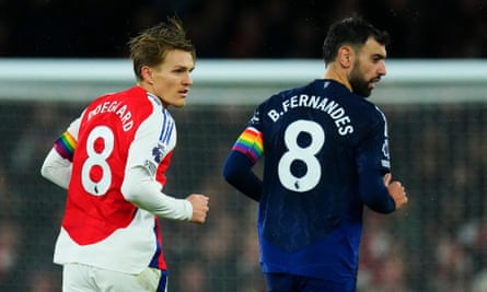 Bruno Fernandes wearing the rainbow captain’s armband, along with his Arsenal counterpart Martin Ødegaard on Wednesday