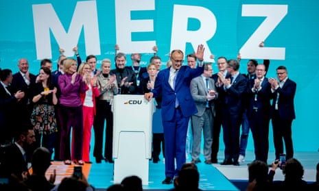 Friedrich Merz, CDU candidate for chancellor and CDU federal chair, celebrates after his speech.