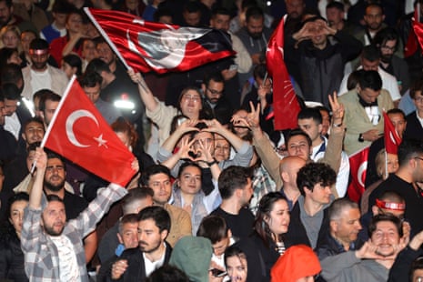 Supporters of opposition candidate Kemal Kılıçdaroğlu chant political slogans at the headquarters of the Republican People's Party, in Ankara.