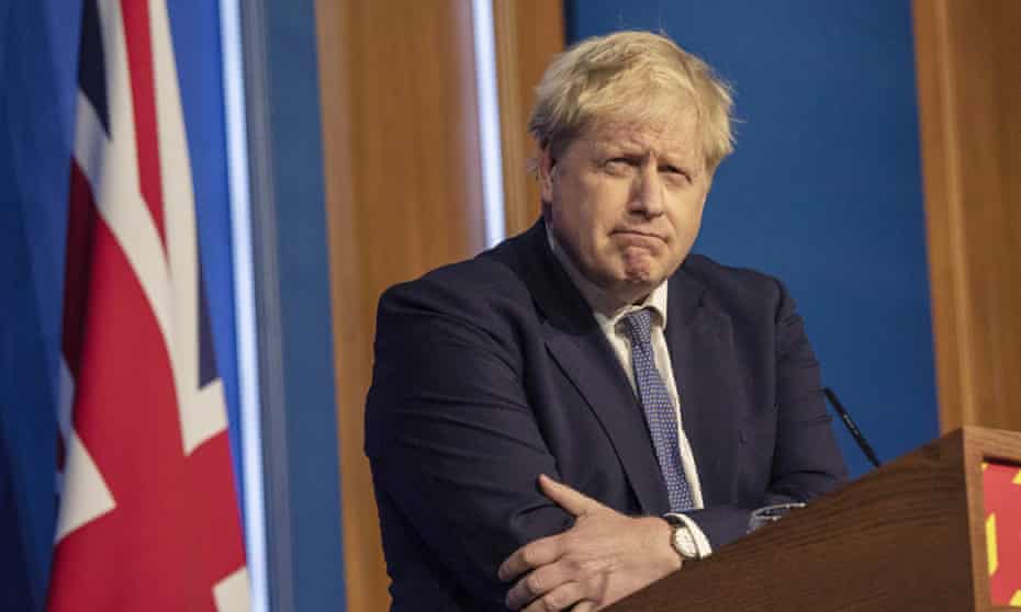 Britain's prime minister Boris Johnson pauses during a coronavirus media briefing in Downing Street, London, Tuesday, 4 January 2022