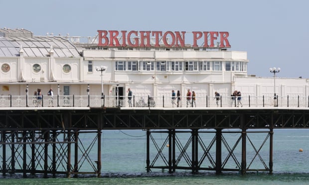 General view of Brighton pier on a warm and sunny day.