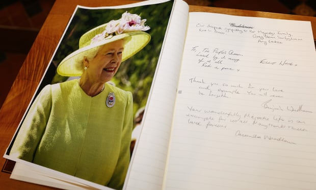 Members of the public leave messages of condolences for Queen Elizabeth II at St. Andrew’s Cathedral in Sydney, Australia