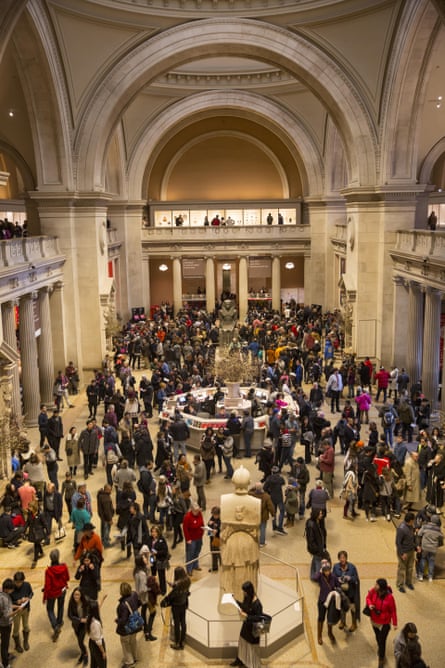 crowd of people in building with tall ceilings