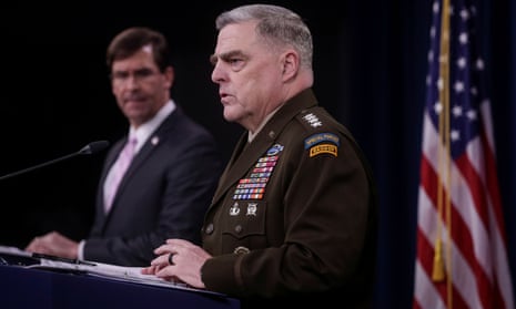 U.S. Defense Secretary Esper and Joint Chiefs Chair Milley hold news conference at Pentagon in Arlington, Virginia<br>U.S. Defense Secretary Mark Esper listens as Joint Chiefs Chairman Army Gen. Mark Milley addresses a news conference at the Pentagon in Arlington, Virginia, U.S., April 14, 2020. REUTERS/Jonathan Ernst