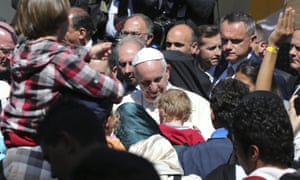 Pope Francis meets refugees on Lesbos.