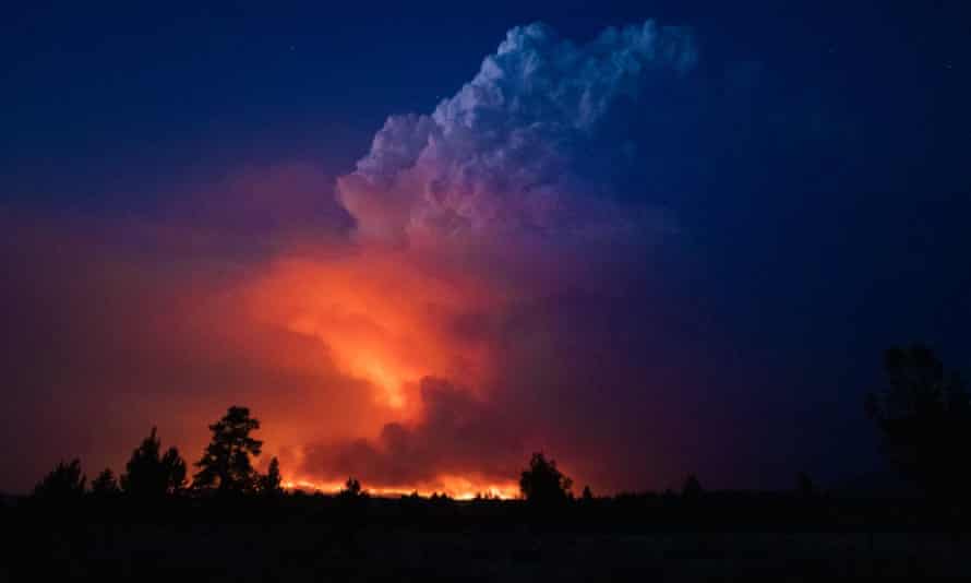 Flames and smoke rise from the Bootleg fire in southern Oregon on 14 July.