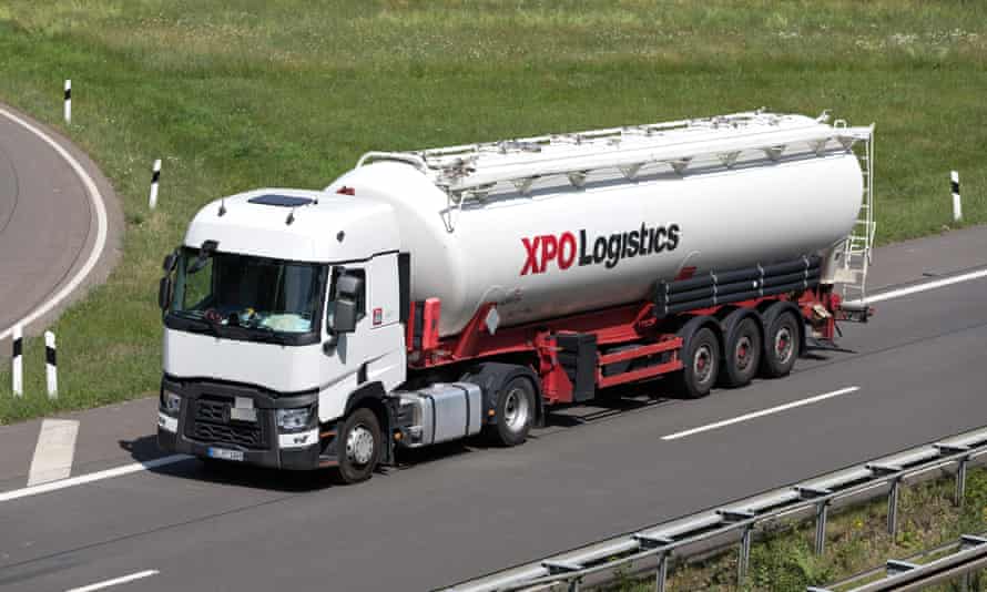 An XPO Logistics lorry with silo trailer on motorway